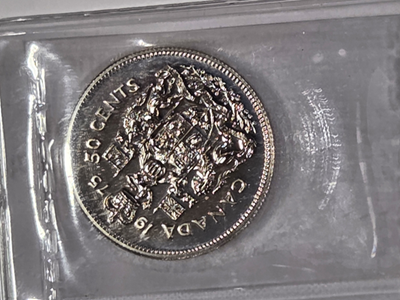 1975 50 cent Graded PL-65
